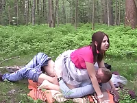 A hot woman is doing a one night stand with a horny dude in the forest