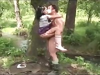 Young brunette gets pounded hard in daytime woods