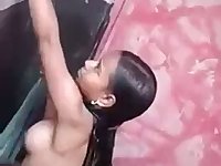 Lovely young Indian amateur chick flashes her big boobs in the shower